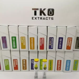 Premium TKO vape cart close-up showing gold cannabis oil