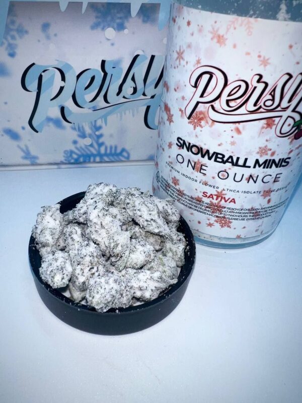 Close-up of frosty Persy Mini Snowballs cannabis buds with rich trichomes