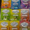 Puff La Gummies with liquid diamonds and hash rosin in colorful packaging